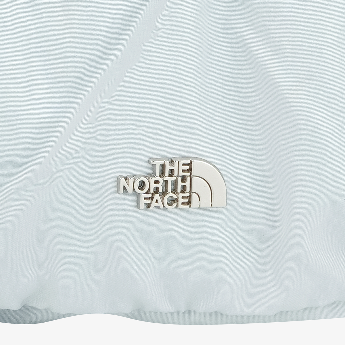 The North Face BONNEY SR CROSS BAG Light Gray logo detail
